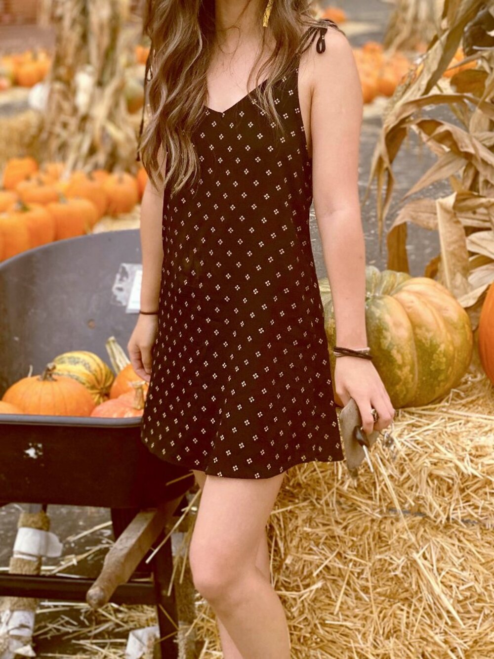 Strapless black dress with gold diamond motif